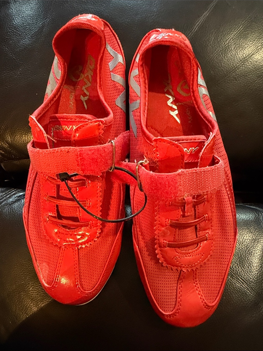 DKNY Red Slip-On Athletic Shoes with Silver Logo